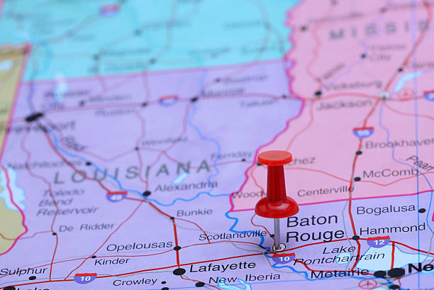 Photo of pinned Baton Rouge on a map of USA. May be used as illustration for traveling theme.